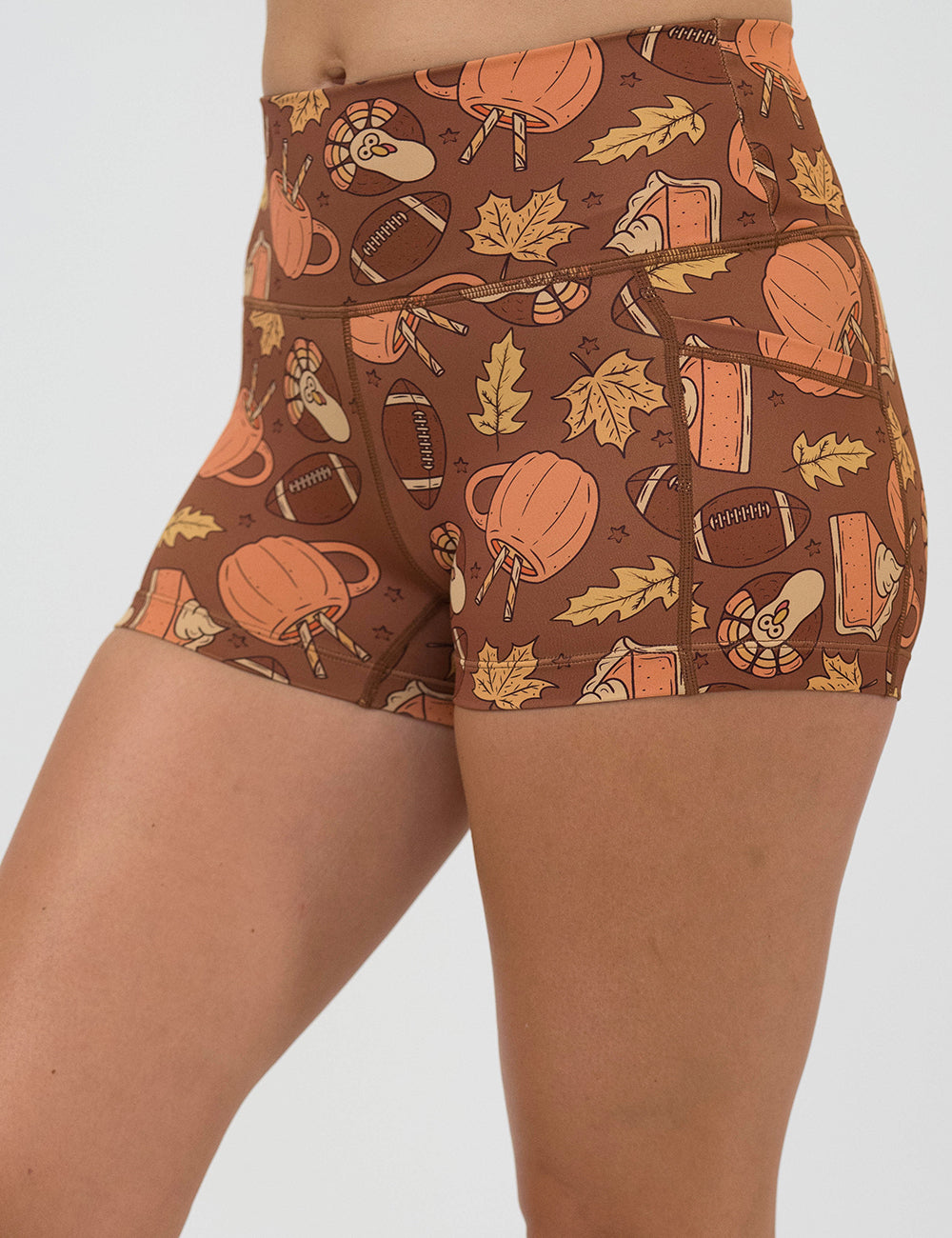 front of the 2.5 inch pumpkin, football, and leaf shorts against a white background