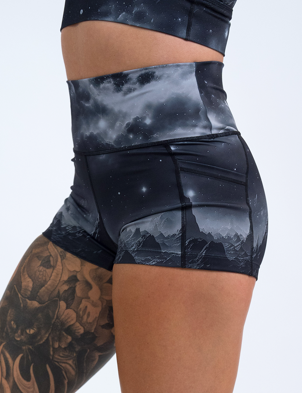 close up of the 2.5 inch dark mountains in space shorts against a white background