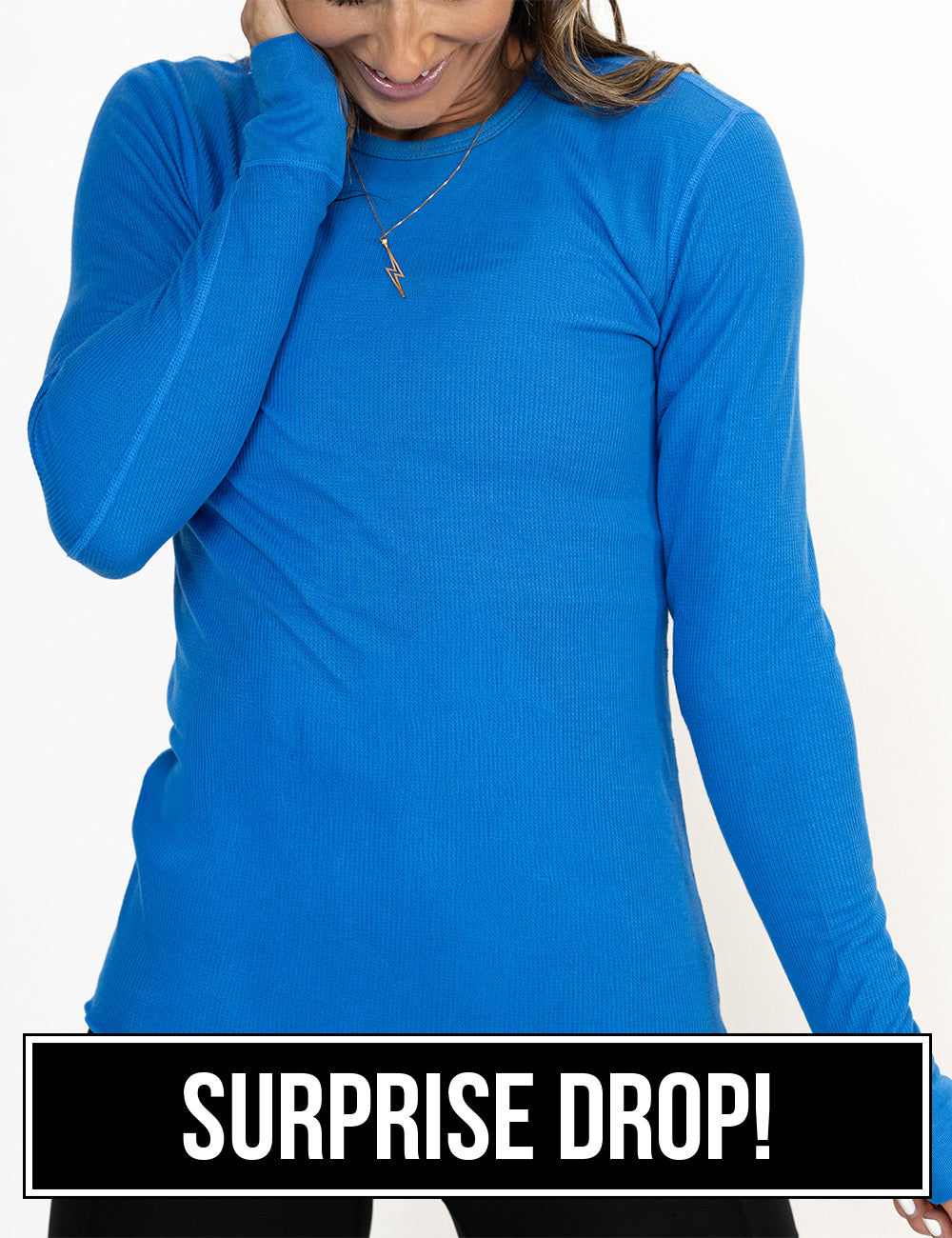 front of the bright blue thermal against a white background, surprise drop