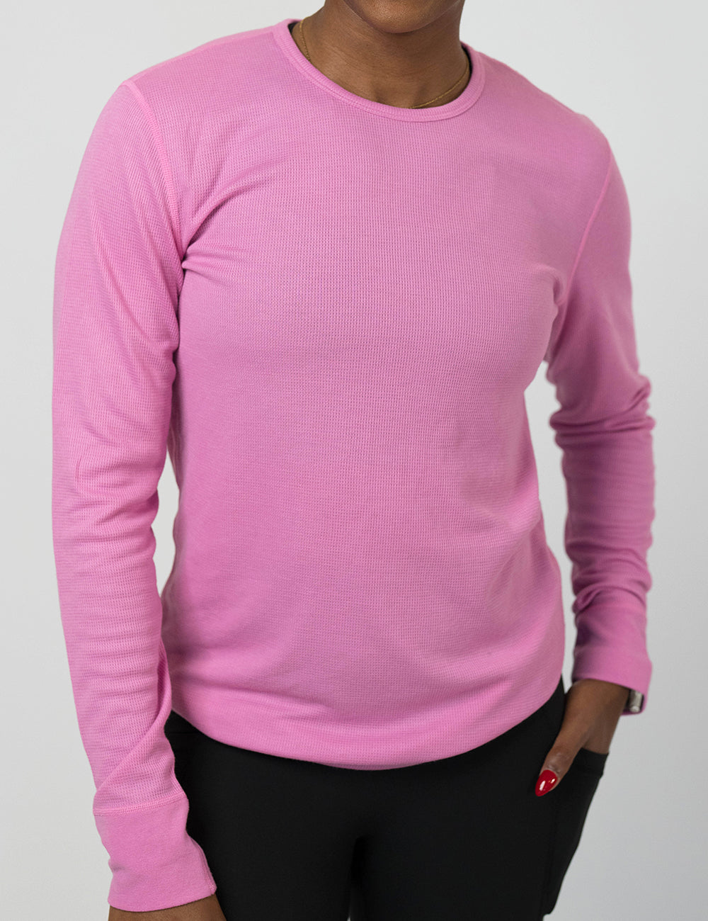 Person wearing a pink long-sleeve