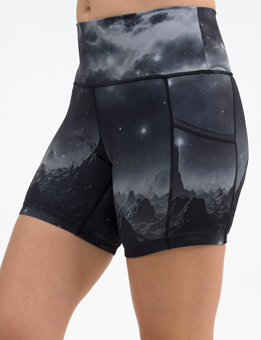 front of the dark mountains in space 5 inch shorts against a white background