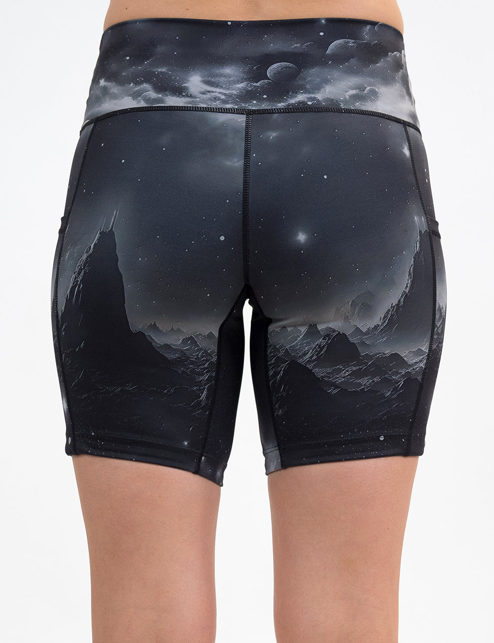 back of the dark mountains in space 7 inch shorts against a white background