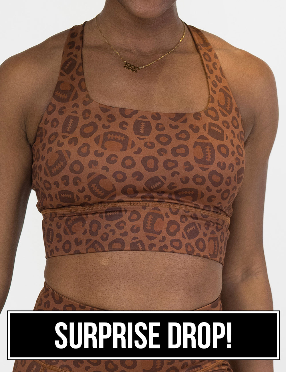 front of the football themed brown leopard print sports bra, surprise drop