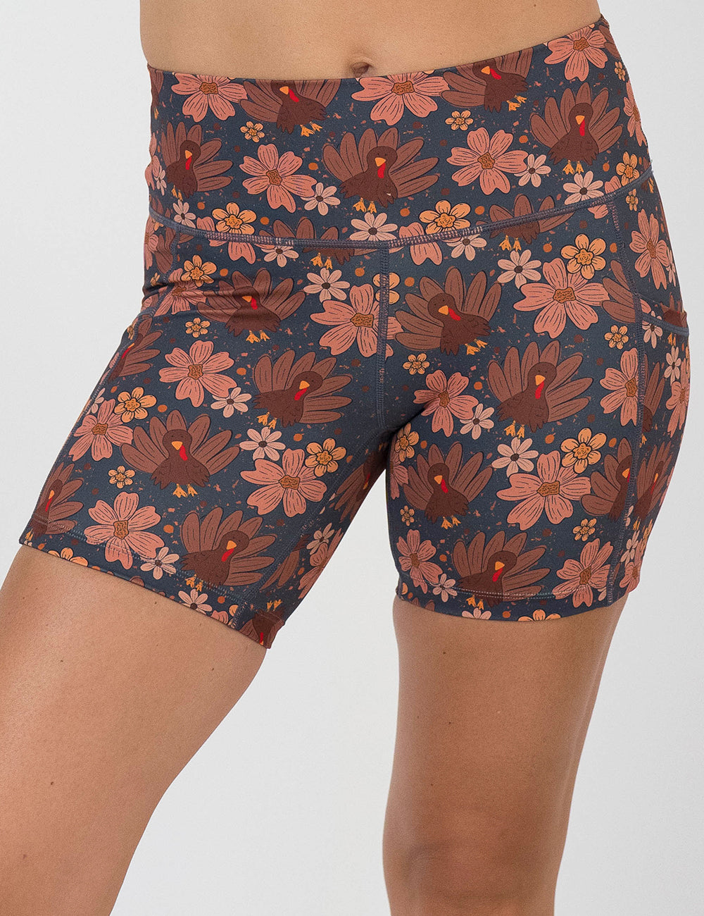 front of the turkeys over a blue background 5 inch shorts against a white background