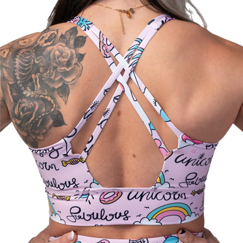 back of pink unicorn themed sports bra