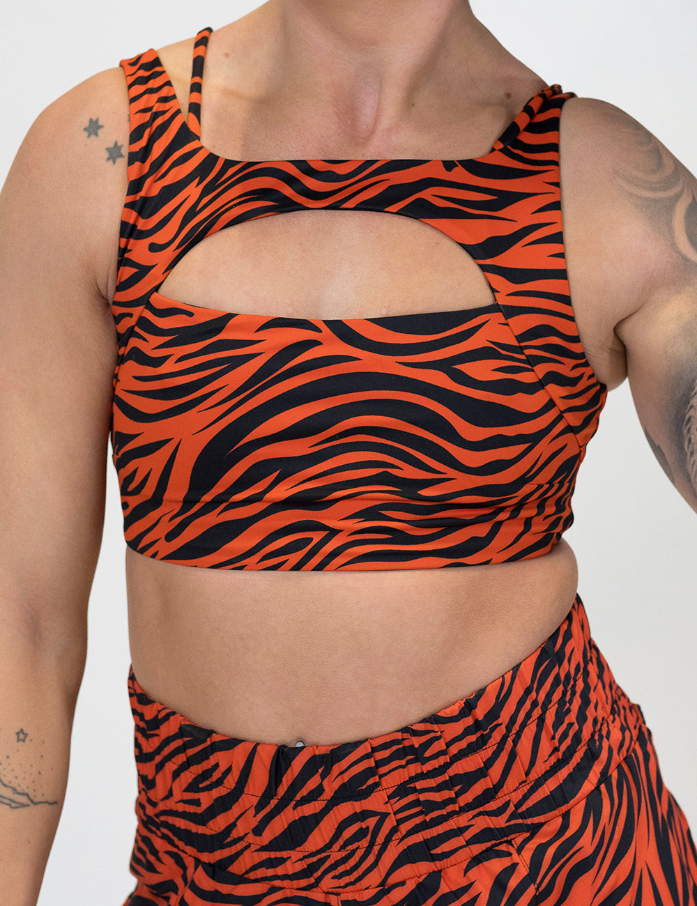 front of the tiger print bra against a white background