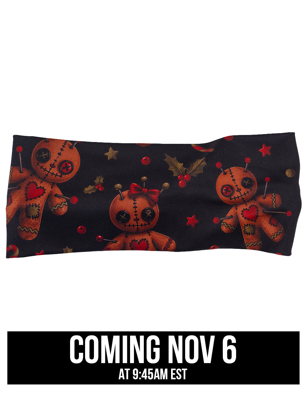 front of the gingerbread voodoo dolls with pins in them surrounded by berries and stars on a black background headband coming November 6th