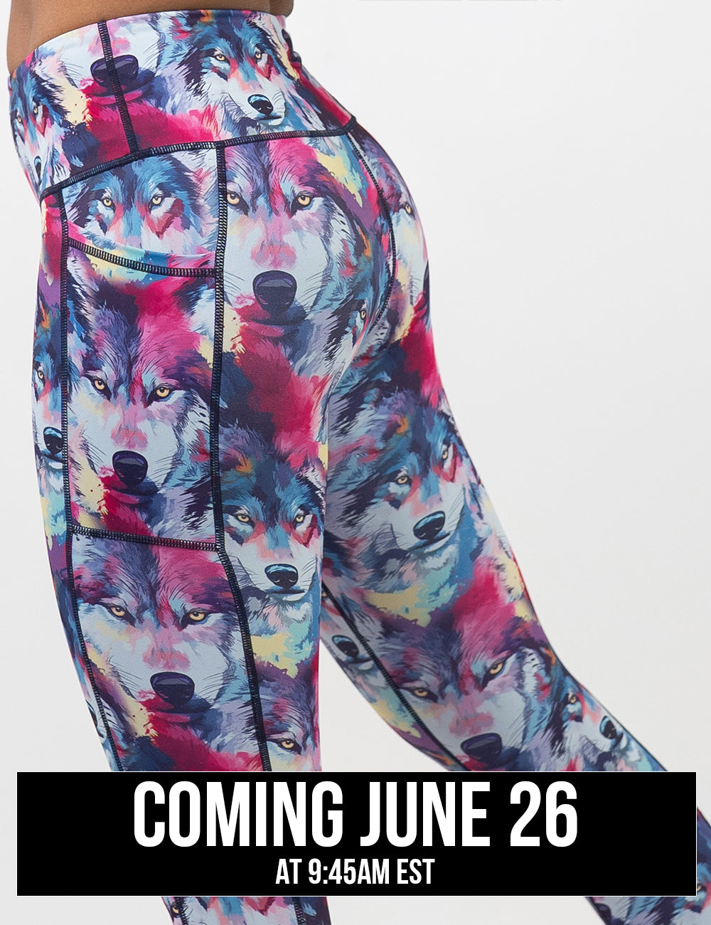 back of the watercolor style red, white, blue, and yellow wolves print leggings against a white background, coming june 26th