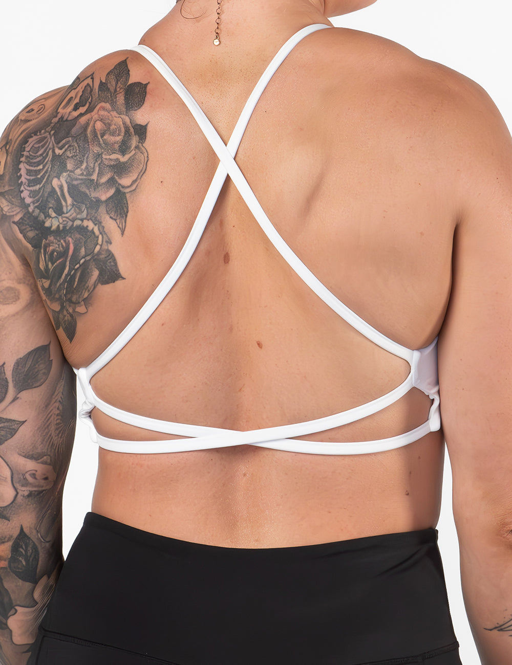 back view of the solid white sports bra