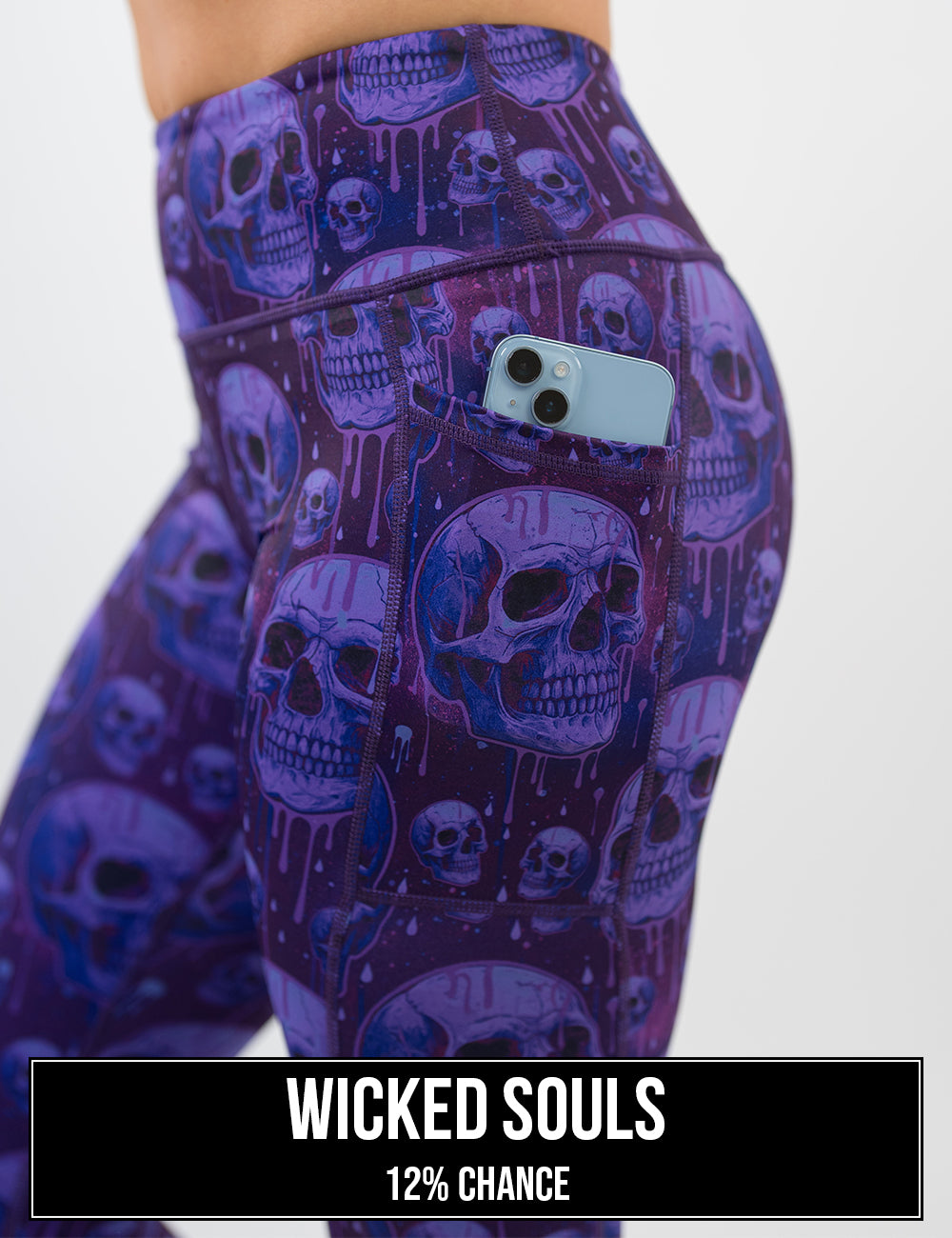 side view of the purple skulls with purple drips with a phone in its pocket, the name of this print is wicked souls and it has a 12% chance of being unboxed