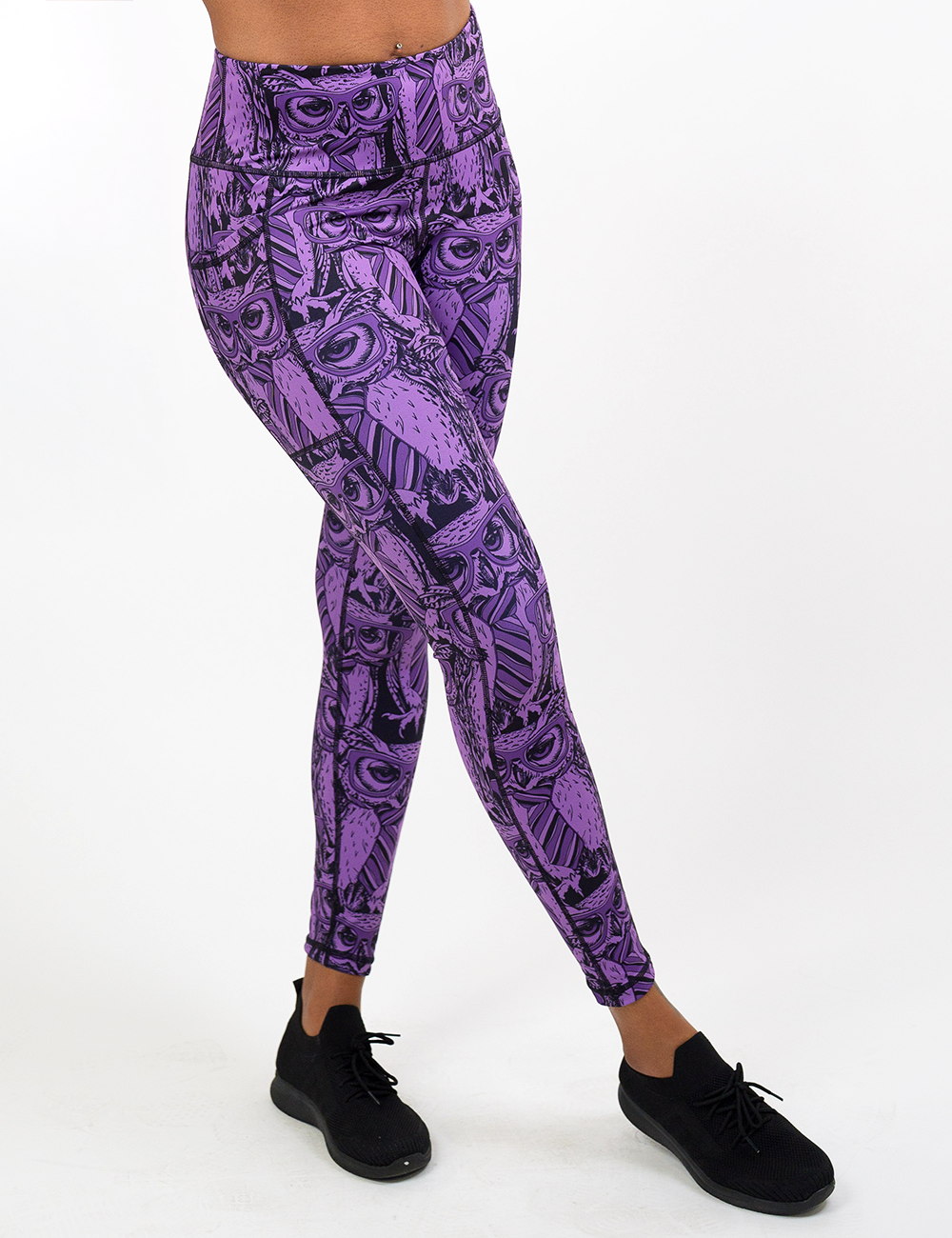 purple owl wearing glasses and a tie print full length leggings facing the front against a white background