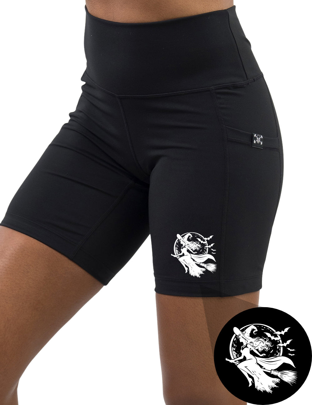 front of the white outline witch riding a broom stick graphic 7 inch shorts