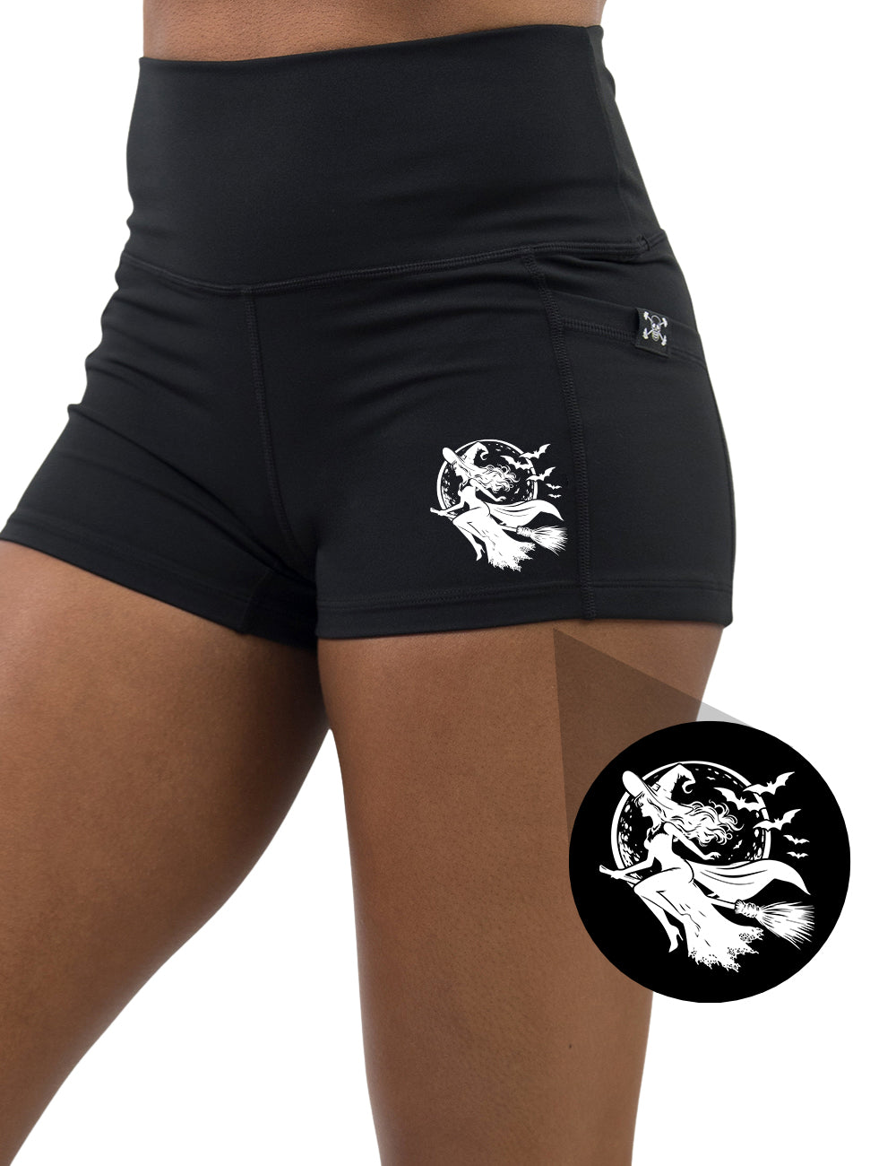 front of the white outline witch riding a broom stick graphic 2.5 inch shorts