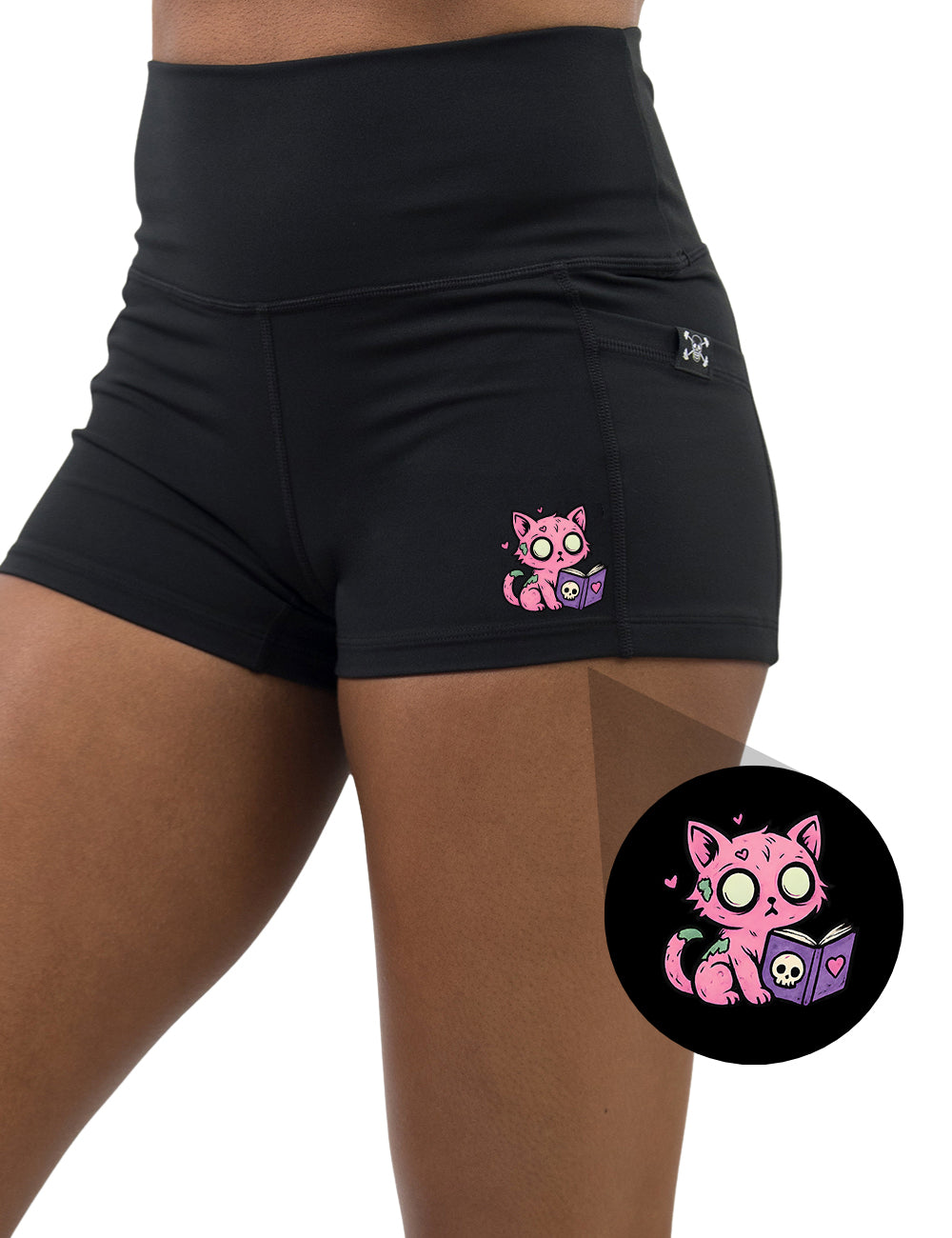 front of the pink zombie cat reading a book graphic 2.5 inch shorts