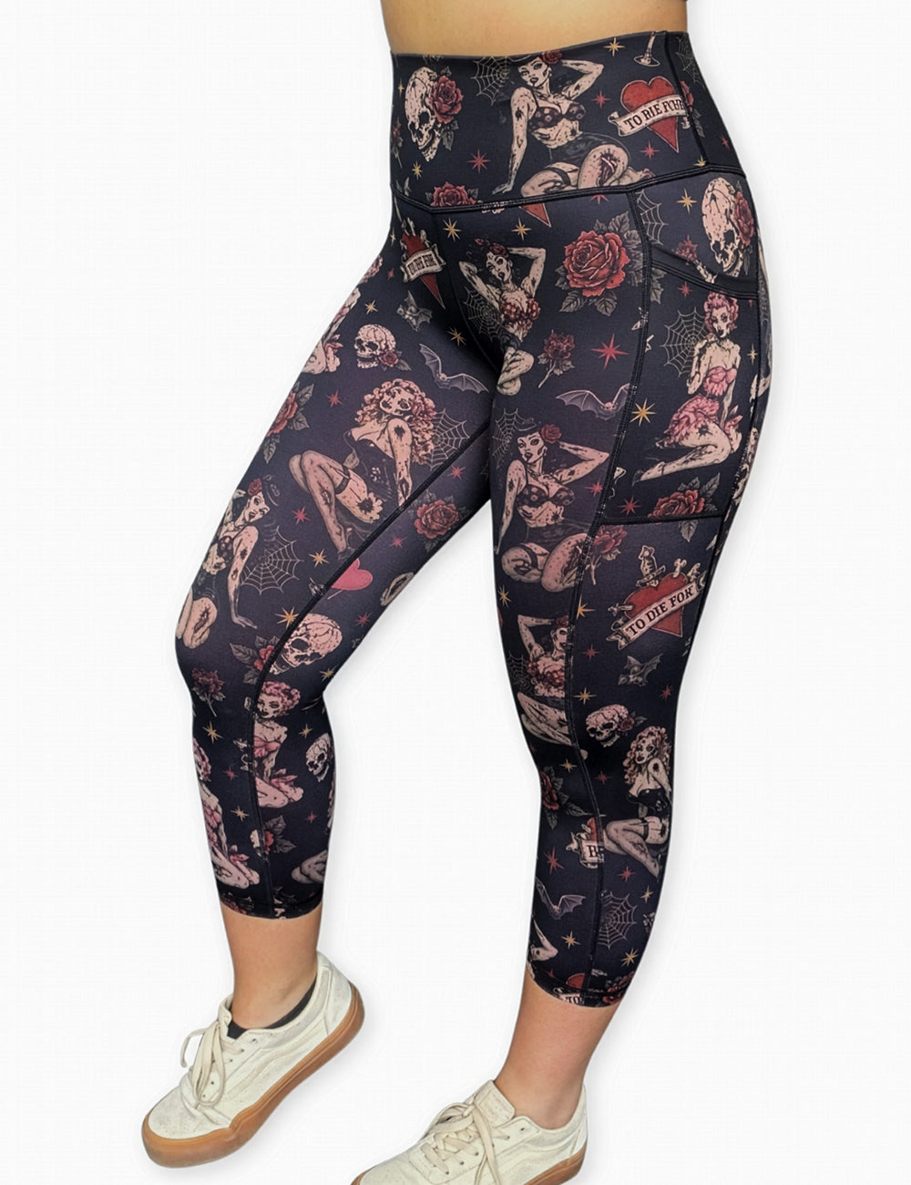 front of the zombie girls with pin up hair and traditional tattoo designs capri leggings against a white background
