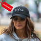 Photo of a model wearing a black snapback hat that has the CVG logo on the front. There is a clearance tag graphic on the top left of the photo.