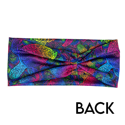 back view of headband with pink, yellow, blue, green and purple ombre turtle print on it 