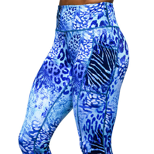 close up of blue and white zebra, leopard and snakeskin print leggings