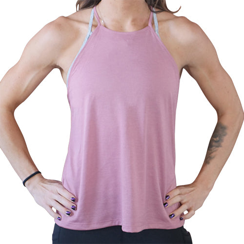 model wearing a light pink high neck flowy tank top