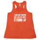 "I Like My Coffee Like I Like My Body Strong AF" quote in white lettering on orange racerback shirt