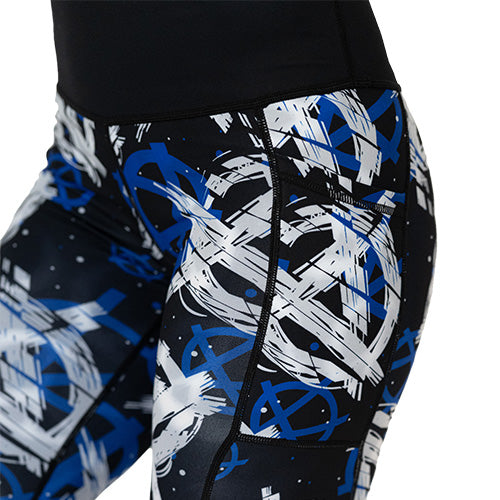close up of white, blue and black anarchy symbol print leggings