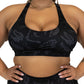 front view of black sports bra with grey dinosaur skull and bones