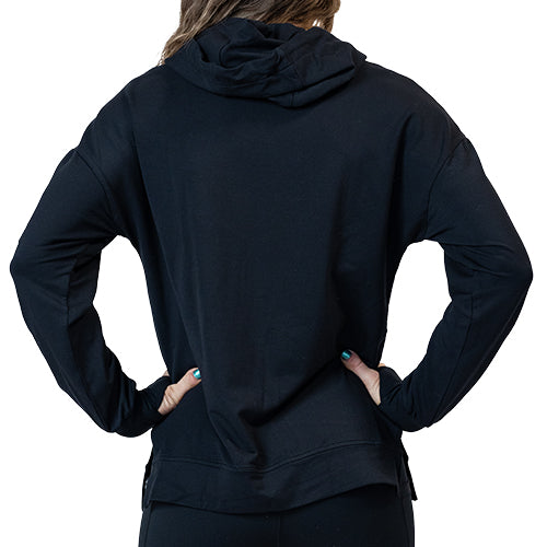 Photo of the back of a model wearing a black hoodie