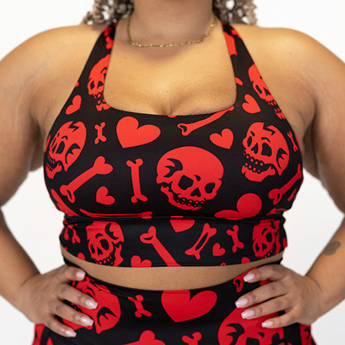 red and black bra with skulls, bones and hearts