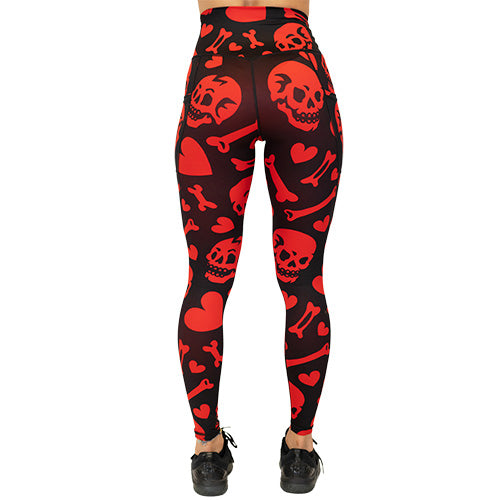 red and black leggings with skulls, bones and hearts