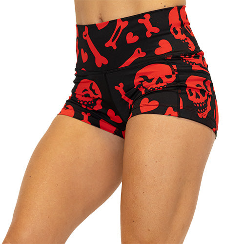 red and black shorts with skulls, bones and hearts