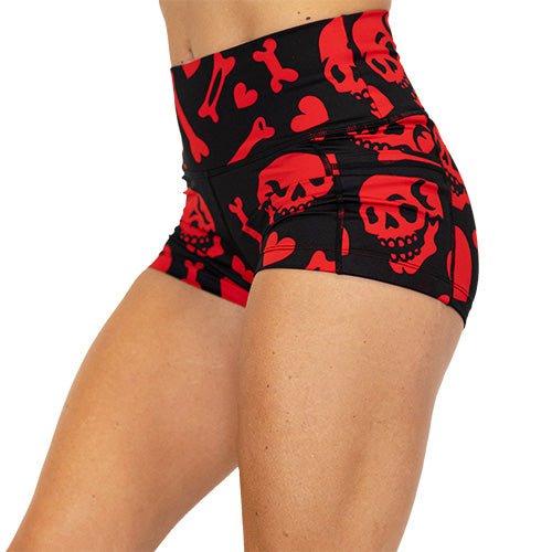 red and black shorts with skulls, bones and hearts