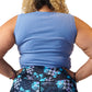 Close up photo of the back of a model wearing a blue fitted crop top