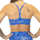 back view of criss cross strap detail on blue and purple holographic pattern bra