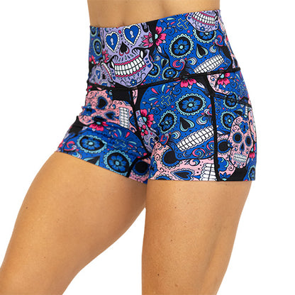 front view of blue, pink and teal sugar skull pattern on 2.5" shorts