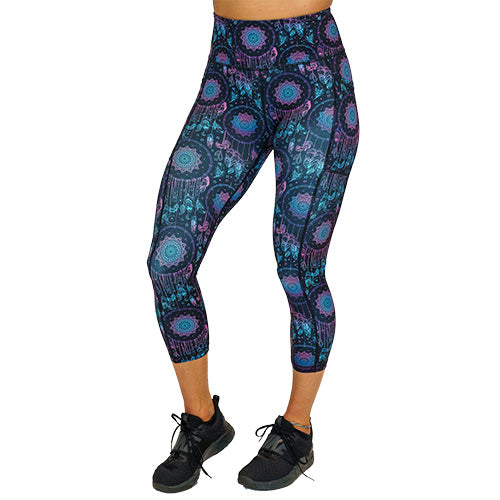 front view of capri length pink and blue ombre dream catcher print leggings