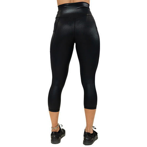 back view of capri length black faux leather leggings