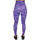 back view of full length purple leggings with comic book style action bubbles that say "badass", "fierce" and "dedication"