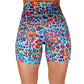 back view of 5 inch rainbow giraffe print shorts 