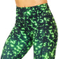 close up of lime green and black dot print on the leggings