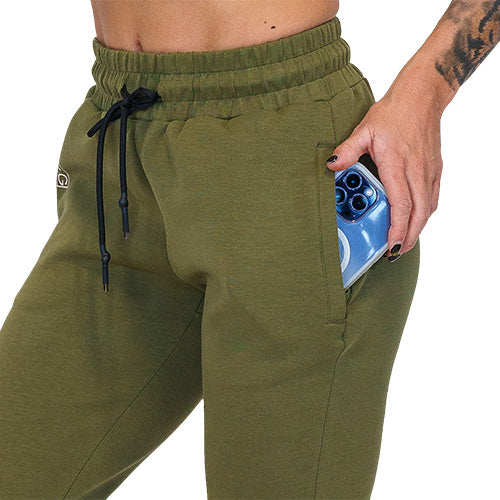 Close up photo of the army green joggers, showing how a phone can fit in the pockets