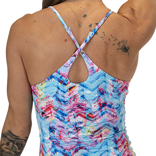back criss cross strap design on colorful geometric feather patterned dress