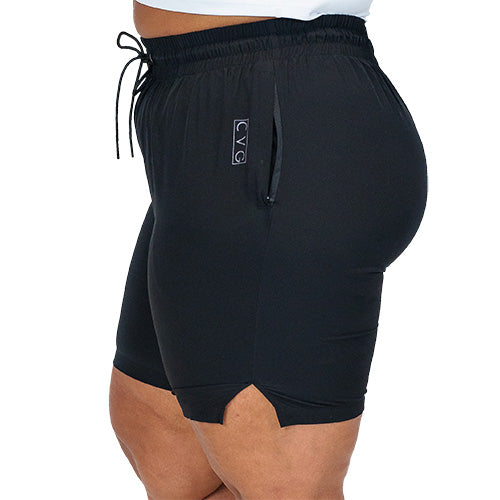 side pocket view of black quarter length unisex shorts