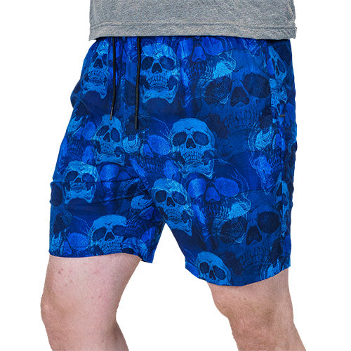front view of blue skull quarter length unisex shorts