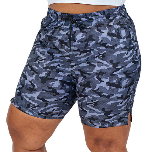 front view of black and grey camo quarter length unisex shorts