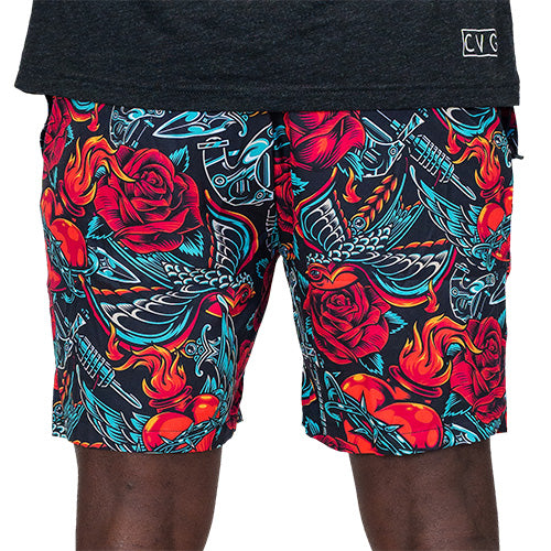 back view of heart, roses and chains design on quarter length unisex shorts