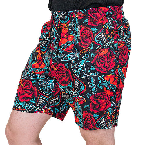 side view of heart, roses and chains design on quarter length unisex shorts
