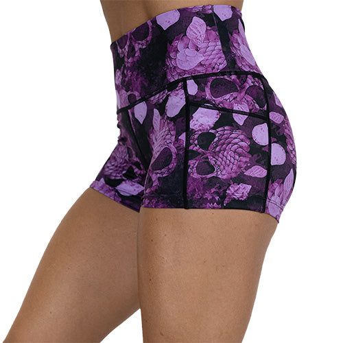 side view of 2.5 inch berry colored mermaid skull patterned shorts
