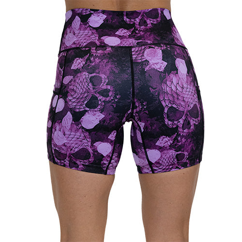 back view of 5 inch berry colored mermaid skull patterned shorts