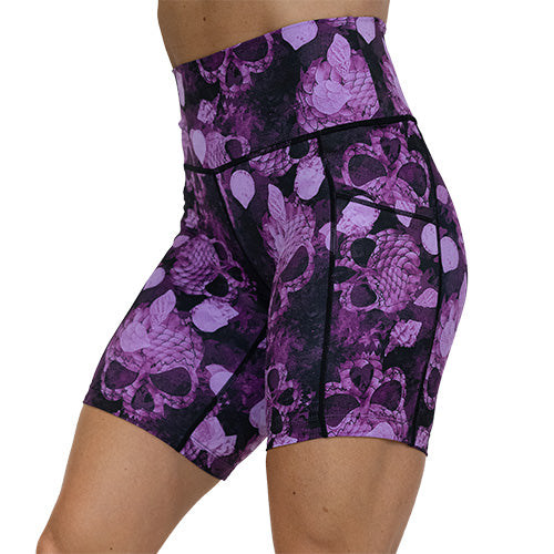 side view of 7 inch berry colored mermaid skull patterned shorts