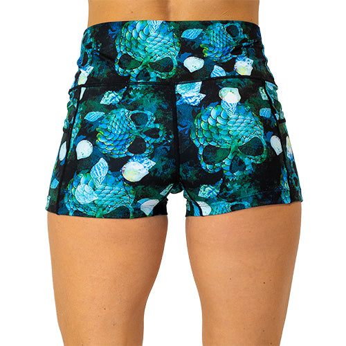 back view of 2.5 inch green colored mermaid skull patterned shorts